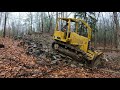 Pushing in a new driveway with a dozer