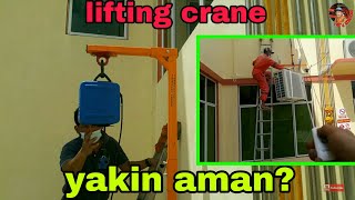 hati hati saat pemasangan Lifting crane outdoor unit ac