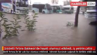 Şiddetli fırtına Balıkesir'de hayatı olumsuz etkiledi, iş yerinin çatısı karayoluna fırlattı