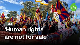 Tibetan activists clash with Pro-China supporters during a protest in Australia's capital