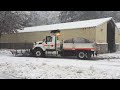 it is snowing at the caltrans mount shasta maintenance station