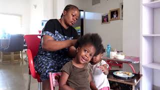 Preparing for school resumption after the break making Beverly's hair