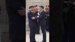 Frances's Macron Welcomes China's Xi to Paris