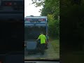 Republic Services Mack LR Mcneilus rear loader garbage truck on trash pickup.