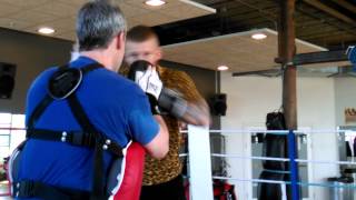 Patrick Nielsen on the pads with coach Joey Gamache