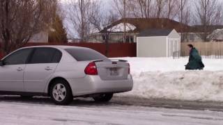 Throwing snowballs at cars