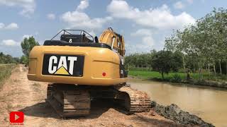 แมวเหลืองหาปลา CAT320D2 งานลอกคลองเคลียร์ริงชลประทาน