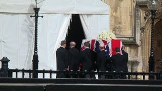 Margaret Thatcher's coffin heads to parliament