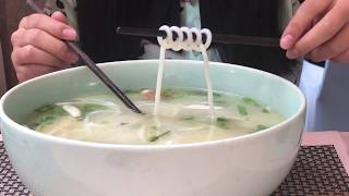 Yunnan's most famous dish:crossing the bridge noodles