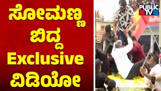 Fan Accidentally Pulls Down Minister V Somanna During Campaign In Chamarajanagar | Kiccha Sudeep