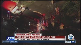 Crews respond to house fire on Military Trail