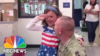 Watch: Two military parents surprise their daughters during school