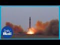 Footage: North Korea fires ballistic missiles near Japan