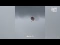 Parasailer stuck in storm