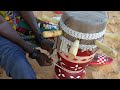 skinning a senegalese traditional drum—mbeng mbeng sabar