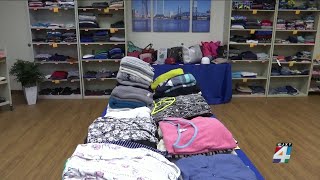 Clinical research center gives back to community through clothing donation event