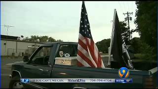 Students rally after classmate told to remove flags from truck