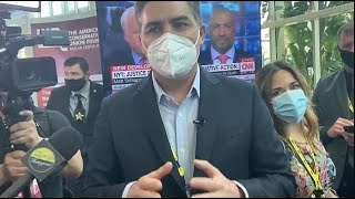 Conservative reporter confronts CNN's Jim Acosta at CPAC