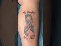 name on ribbon tattoo by hector salazar tattoos yuma az tattoo shop yumaaz