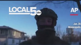 Federal officers push AP journalists back to car as they document enforcement operation