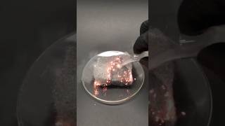 Pouring liquid oxygen onto steel wool