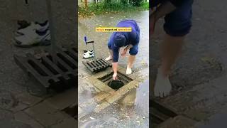 Unclogging a storm drain after rain on a gravel car park in Germany#viralvideo#trending #shorts