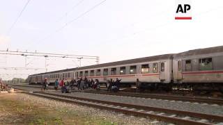 Timelapse of migrants boarding train