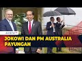 Jokowi dan PM Australia Asyik Berbincang di Saat Hujan