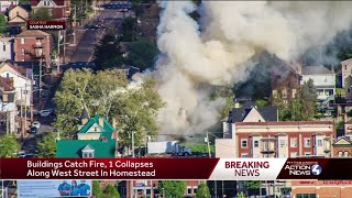 Crews battle 2-alarm fire in Homestead involving multiple buildings