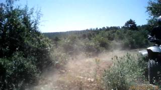 Polaris Predator 500 and Derby DRX 250 on stony ground REAR POV camera view