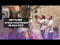 Israeli settlers attack Palestinians in occupied East Jerusalem