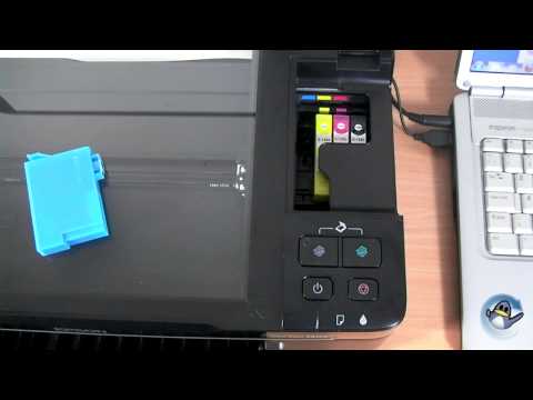 How to Change Ink Cartridges with a Epson Stylus SX125 How to Change Ink Cartridges with a Epson Stylus SX125