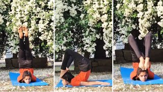 Poorna Salabhasana (Locust Pose) with stretchings.