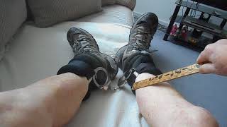 ankles cuffed and bound bare legs spanked with masters ruler