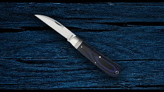 The Rough Ryder RR2181 Denim Micarta Swayback Work Knife