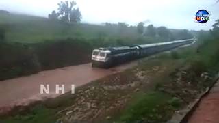 Train plying in Flooded tracks Indian Railways