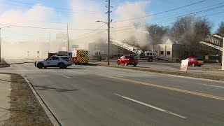 Crews respond to building fire along SW 9th Street