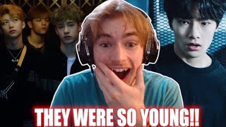 MY FIRST TIME EVER REACTING TO STRAY KIDS DEBUT!! | 'Hellevator' MV + 'District 9' MV