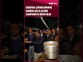 delhi elections kejriwal eating momos during the election campaign in new delhi