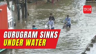 WATCH: Gurugram sinks under water after heavy rainfall, faces waterlogging, traffic snarls