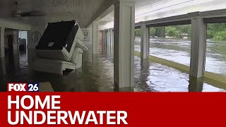 Conroe woman's home underwater after flooding