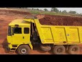 jcb 3dx backhoe loading mud in tata 2518 tata 3118 and 2 ashok leyland 2518 truck