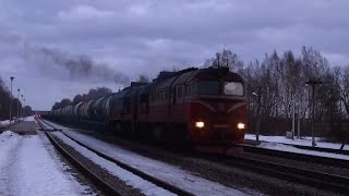 [LG] 2M62K-1163 on a freight train, at Kyviškės station