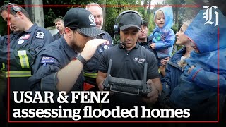USAR & FENZ team assessing risk to homes after Auckland flooding | nzherald.co.nz