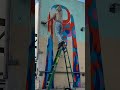 SPRAYPAINTING a MURAL on a DESTROYED BUILDING #art #shorts #mural