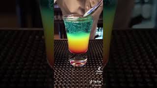 How to Make a Rainbow Shot 🌈 #cocktail #mixology #drink #rainbow #shots #mixologymagic  #bartender