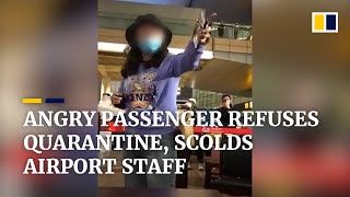 Angry passenger scolds airport staff in China after refusing to be quarantined