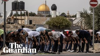 Palestinians pray outside as Israel tightens security around al-Aqsa mosque