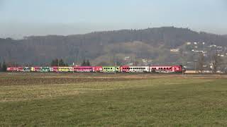 4K ÖBB: Bunter ÖFB Railjet in grüner Vorarlberger Winterlandschaft in Sulz-Röthis