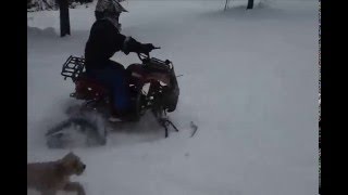 mini atv with track 125cc on deep snow